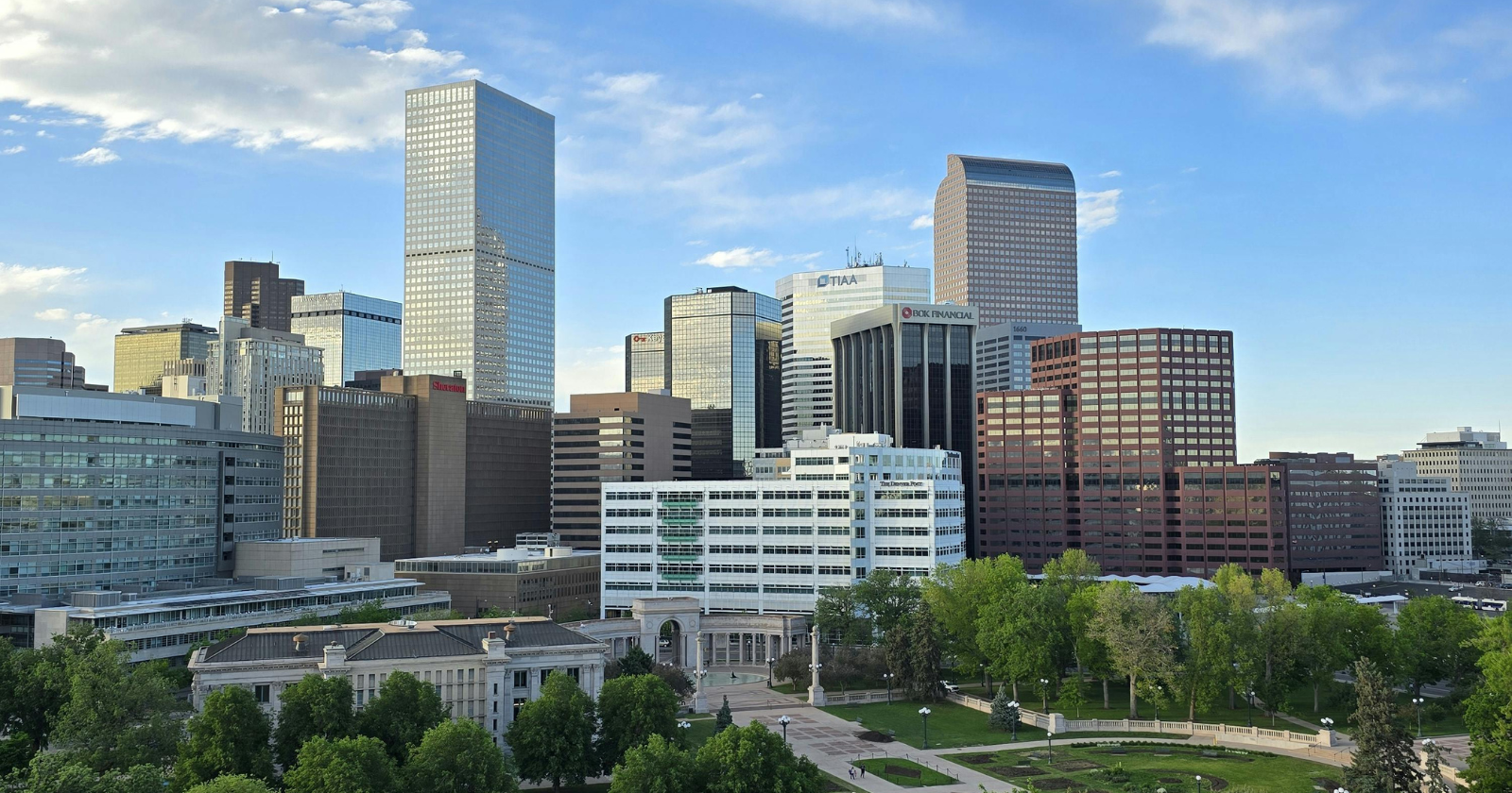 Family discussing professional drug intervention support with a counselor in Denver